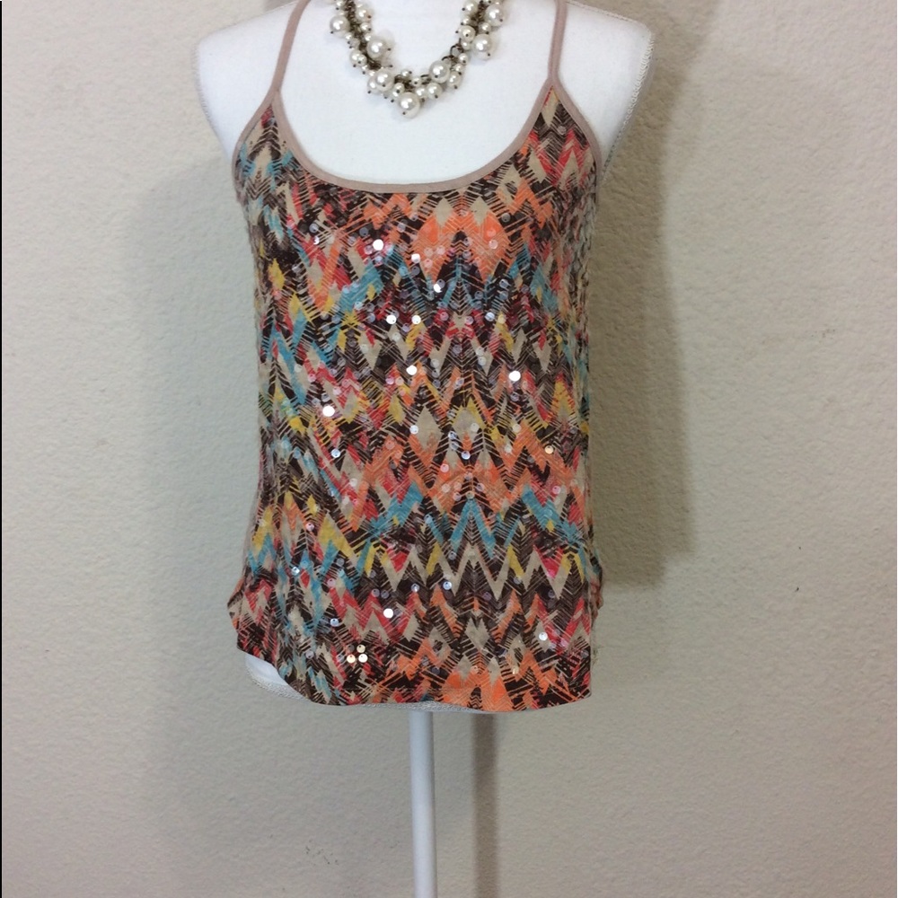 A Tan  , multi color sequence tank.